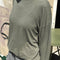 model wearing sage linen blend long sleeve top