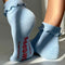 back view of model wearing periwinkle ruffle socks