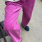 model wearing lilac pink corduroy arc pants