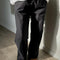 model wearing black cotton straight leg work pants