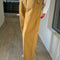 side view of model wearing dijon yellow cotton straight leg work pants