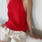 model wearing red knit halter sweater top 