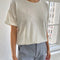 model wearing bone relaxed tee