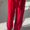 model wearing red apple pointelle balloon pants