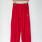 red apple pointelle balloon pants on a hanger
