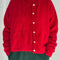 model wearing red mohair cardigan