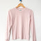 light pink pointelle long sleeve tee on a hanger