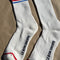 white ribbed socks with red and blue stripes