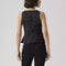 back view of model wearing black denim peplum tank top