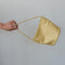 model swinging pale yellow leather bucket bag