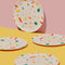 set of 4 cream dinner plates with colorful confetti print