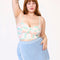 model wearing pastel wavy print bustier tank and matching bottoms