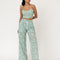 model wearing mint wide leg pants with dainty blueberry vine print and matching cropped tank