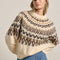 model wearing cream soft sweater with brown and tan nordic print