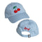 light blue dad hat with embroidered cherry print on the front and red cursive 'Bing!' on the back