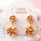 gold double bow tiered dangle earrings
