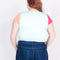 back view of model wearing light blue relaxed baby tee with one red and one orange sleeve and realistic parrot print on the front 