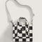 black and white checkered small tote bag with white adjustable strap