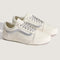 white pair of sneakers with silver metallic laces and iconic stripe