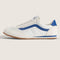 side view of white vans super low pro sneaker with royal blue trim and iconic stripe