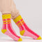 side view of pink and red stripe socks with chartreuse trim