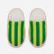 top view of lime green multi striped slide slippers with pink and white sole