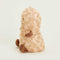 side view of peanut warmie plush