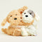 brown dog and white + grey dog hugging warmie plushes