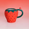 12 oz. strawberry ceramic mug with 3D snail on the handle on red and white ombre background