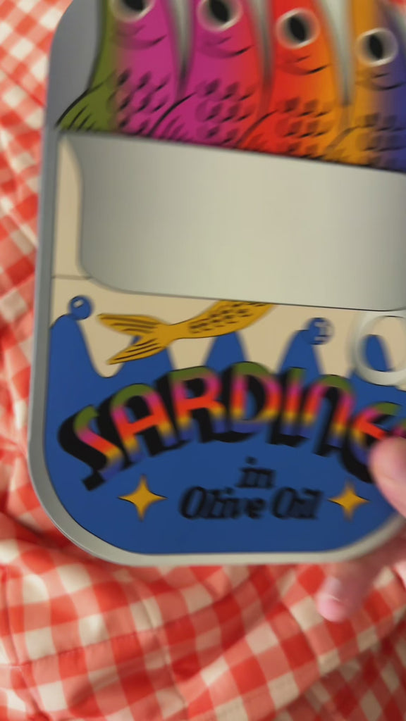 model using colorful sardine bookmarks in a book