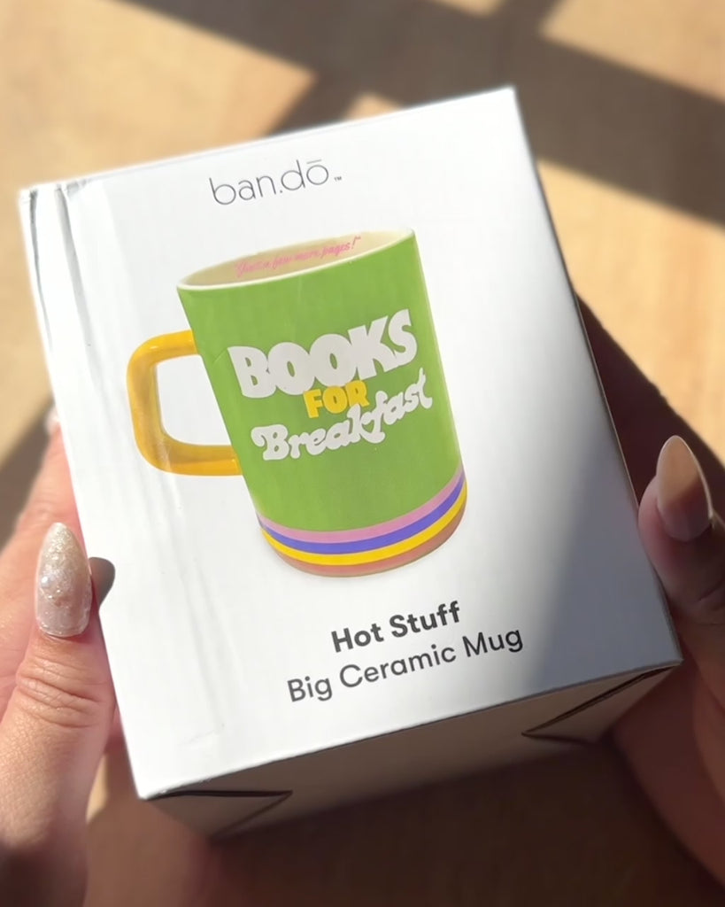green 'books for breakfast' mug