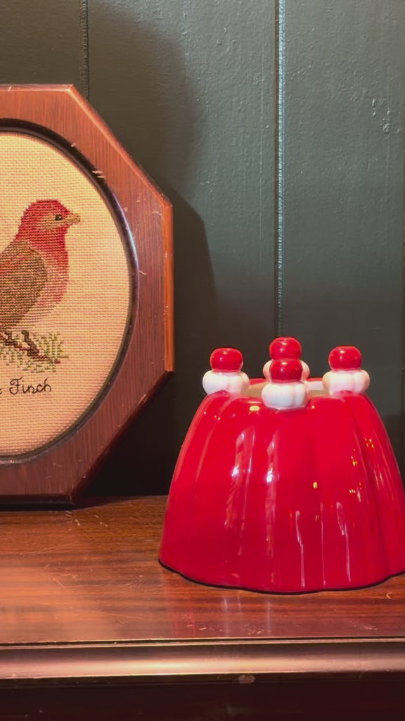 model putting bouquet in jelly dessert vase