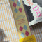 model showcasing book spine bookmarks