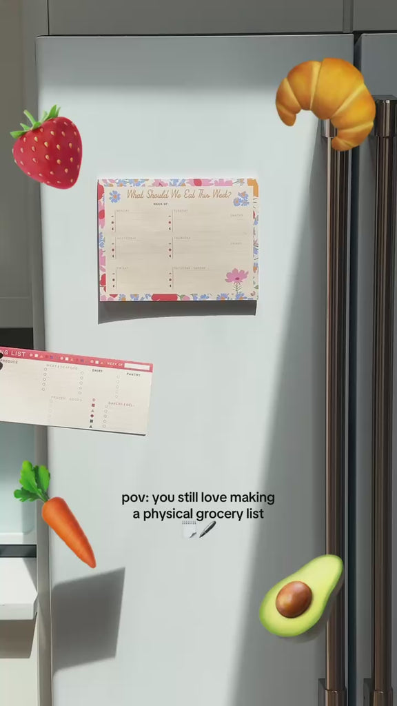 model writing their grocery list on 'what should we eat this week' pad