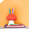 editoral image of editorial image of mushroom vase with red top and white polka dots and white stem holding pens