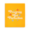 yellow undated planner with 'progress not perfection' across the front