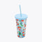overhead view of reusable tumbler with straw in blue strawberry floral pattern